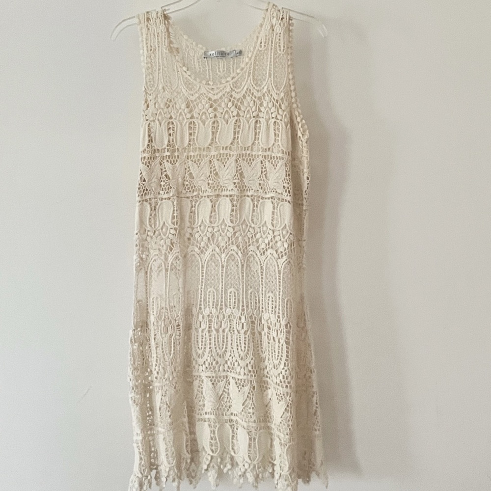 Solitaire by Ravi Khosla ivory cover up